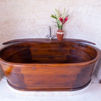 Custom Teak bathtub in master suite